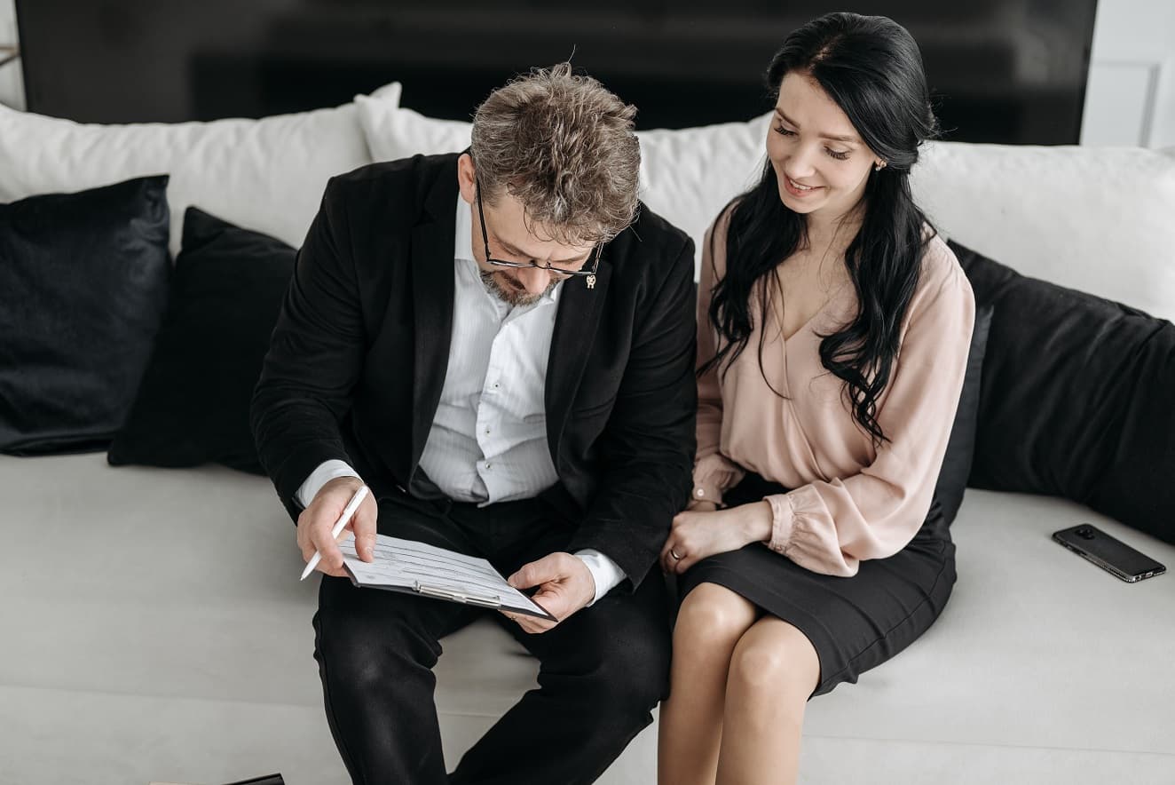 Couple reviewing wedding documents together